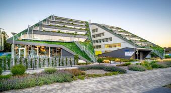 Modern green buildings compete with architectural monuments