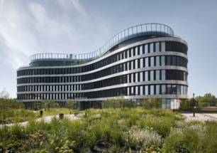 The ORGANICA office building: a unique solitaire full of greenery and elegant curves