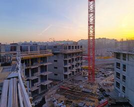 A flag flies over the first stage of the Toivo Roztyly project from YIT